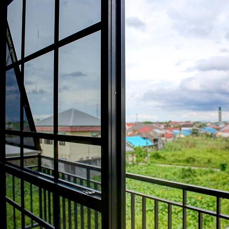 Oyo 90162 Remboelan Guest House Sungai Lutus 외부 사진