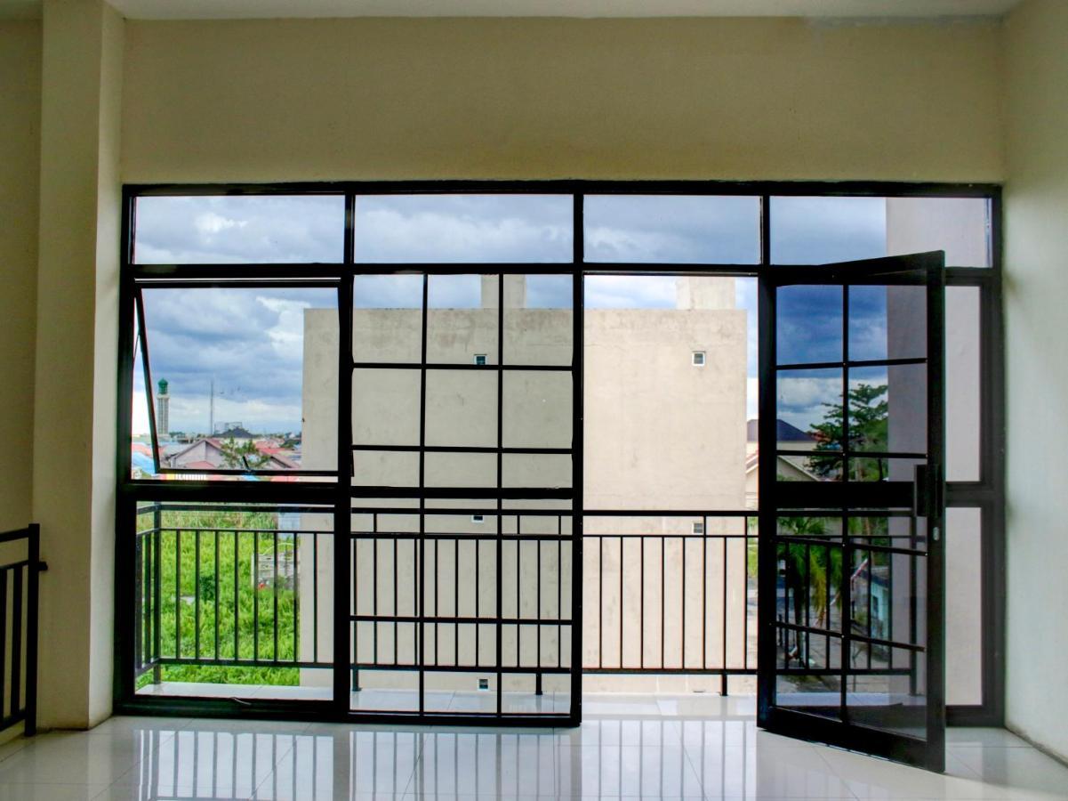 Oyo 90162 Remboelan Guest House Sungai Lutus 외부 사진