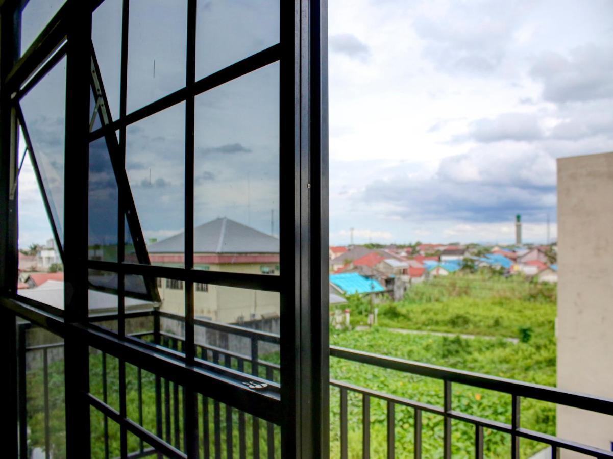 Oyo 90162 Remboelan Guest House Sungai Lutus 외부 사진